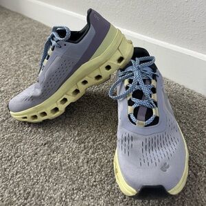 On cloudmonster running shoes in nimbus/hay